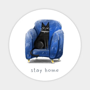 Cartoon black cat in a blue armchair and the inscription "Stay home". Magnet